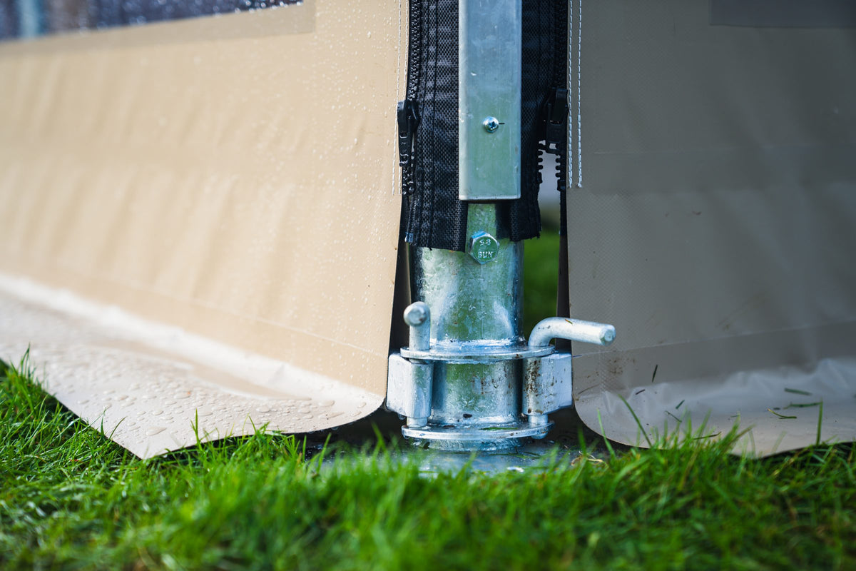 Lower bar fitted at the foot of the upright